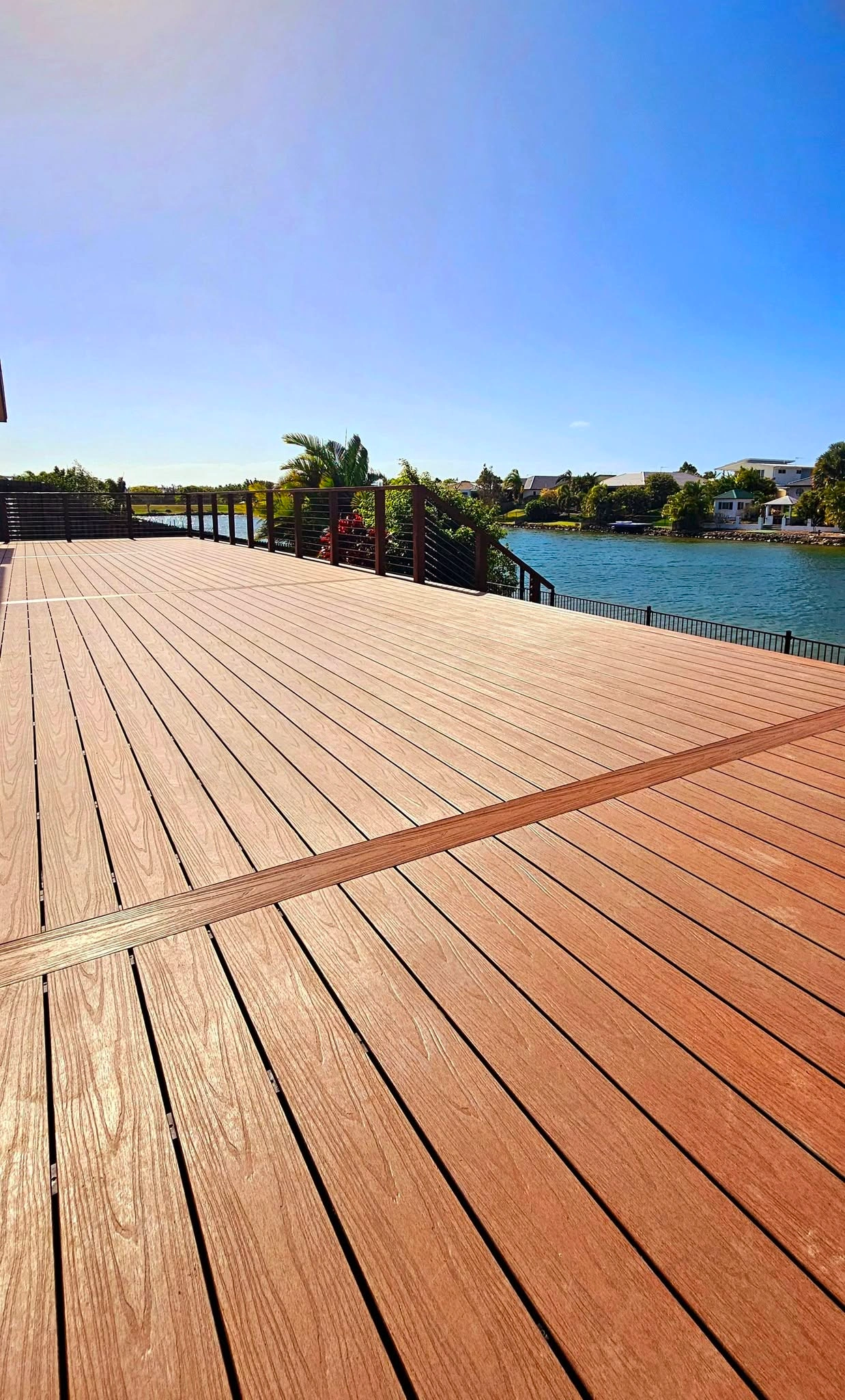 Hardwood timber deck running alongside a canal